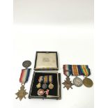 A group of WW1 medals comprising a bar awarded to