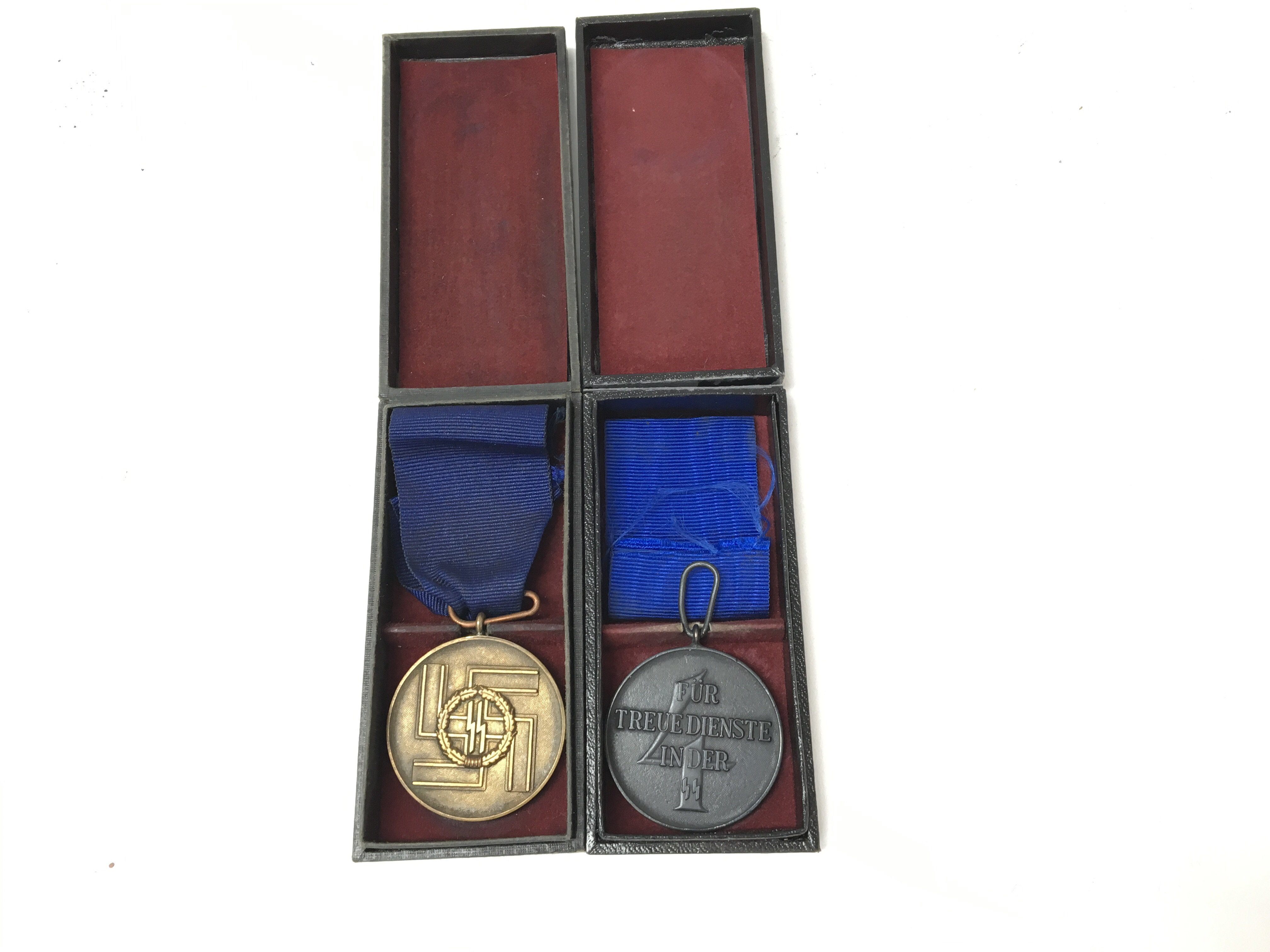 A pair of a German WW2 SS medals including a 4 yea