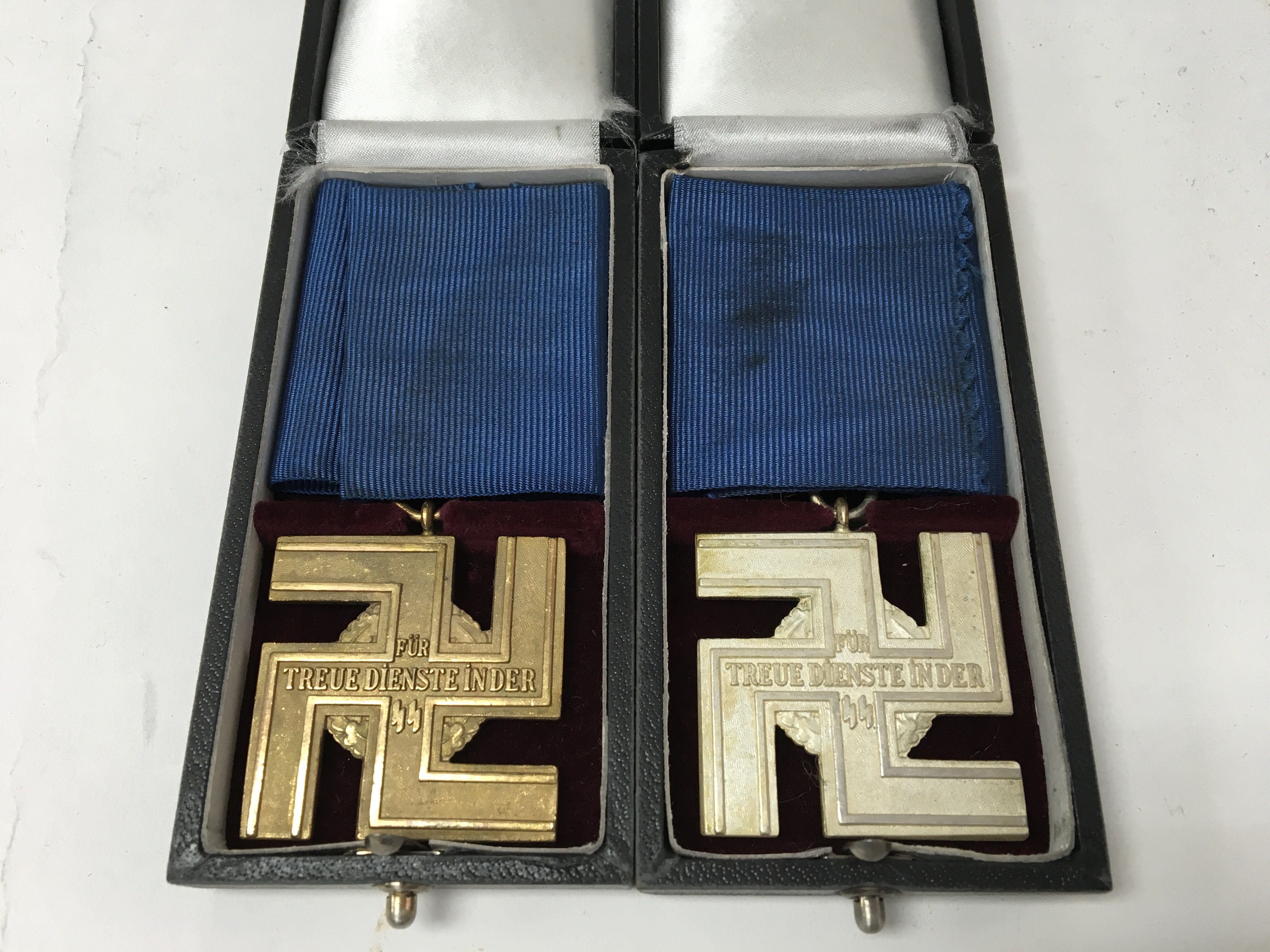 A pair of German WW2 SS long service awards, one f - Image 2 of 2