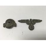 A pair of German WW2 style Waffen SS cap badges of