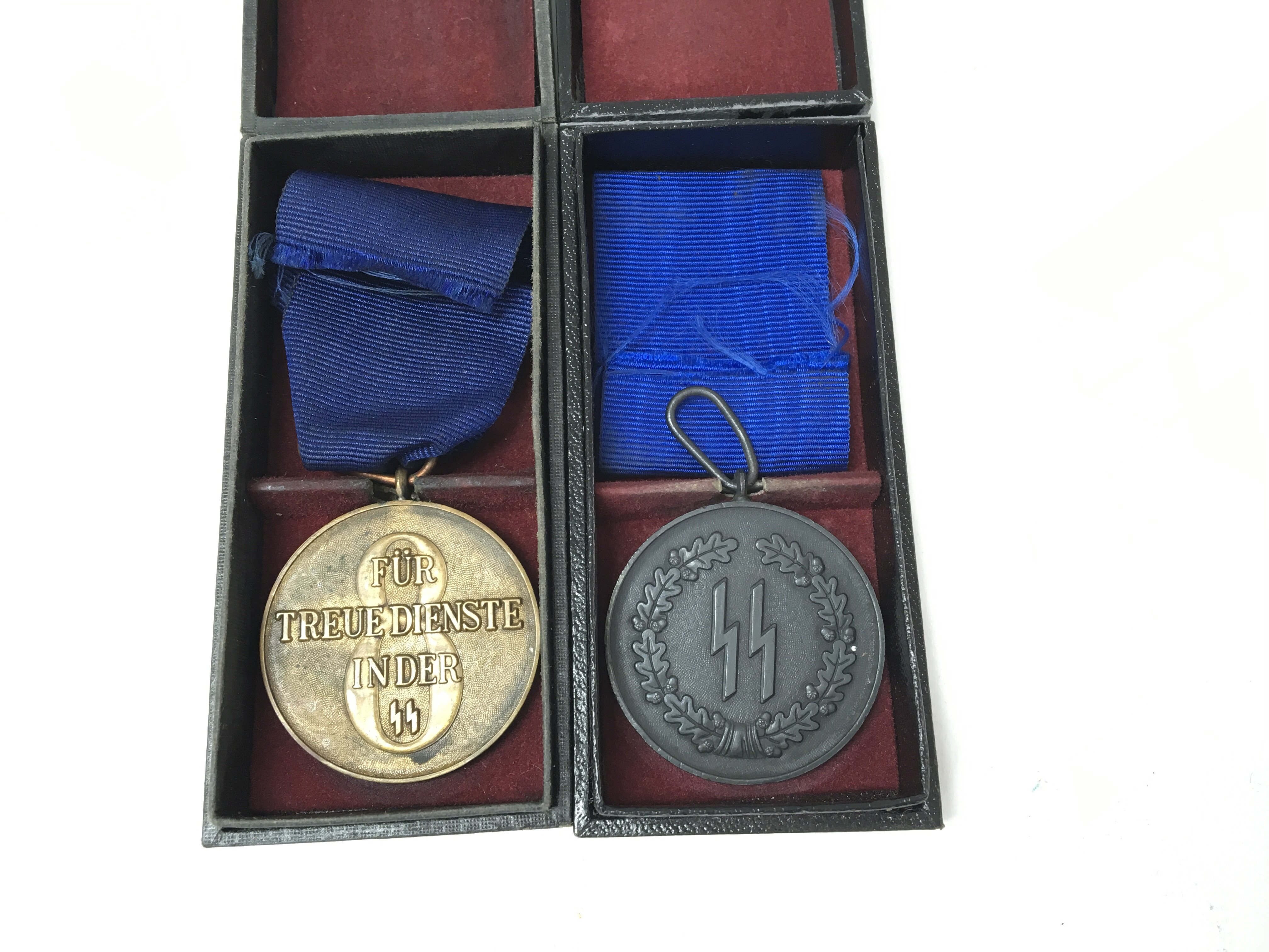 A pair of a German WW2 SS medals including a 4 yea - Image 2 of 2