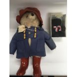 A soft plush Paddington Bear together with a boxed