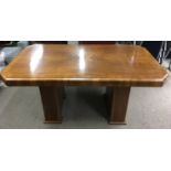 An Art Deco style maple dining table.Approx 84x154x78cm high