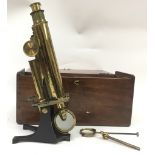 A brass Smith&Beck microscope in wooden box