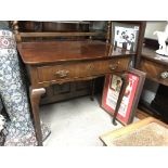 A Walnut George II Irish table with a single drawe