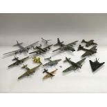 A collection of metal model aircraft.