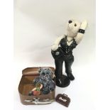 A small Steiff bear in a carry case, hedgehog figu