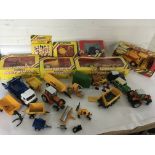 A collection of boxed and loose Britains toys including boxed Autoway, Tractors, Combine harvester