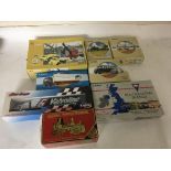 A box of boxed Corgi die cast vehicles including buses, lorries etc