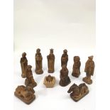 A carved wood set of Nativity figures