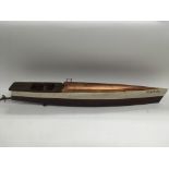 A vintage elastic powered speedboat named Torpedo, approx length 78cm.