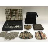 An Osprey clutch bag, three Liberty purses and others.