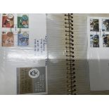 A collection of stamps including presentation packs and first day covers