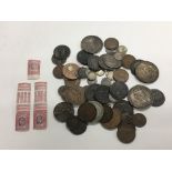 Three unused Edward VII stamps and a collection of used circulated British coinage circa George