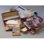 A quantity of loose GB and Commonwealth stamps in packets and tins, together with catalogues and