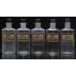 A set of five chemists/ pharmacy glass apothecary bottles with gilt labels including Mist Tussi
