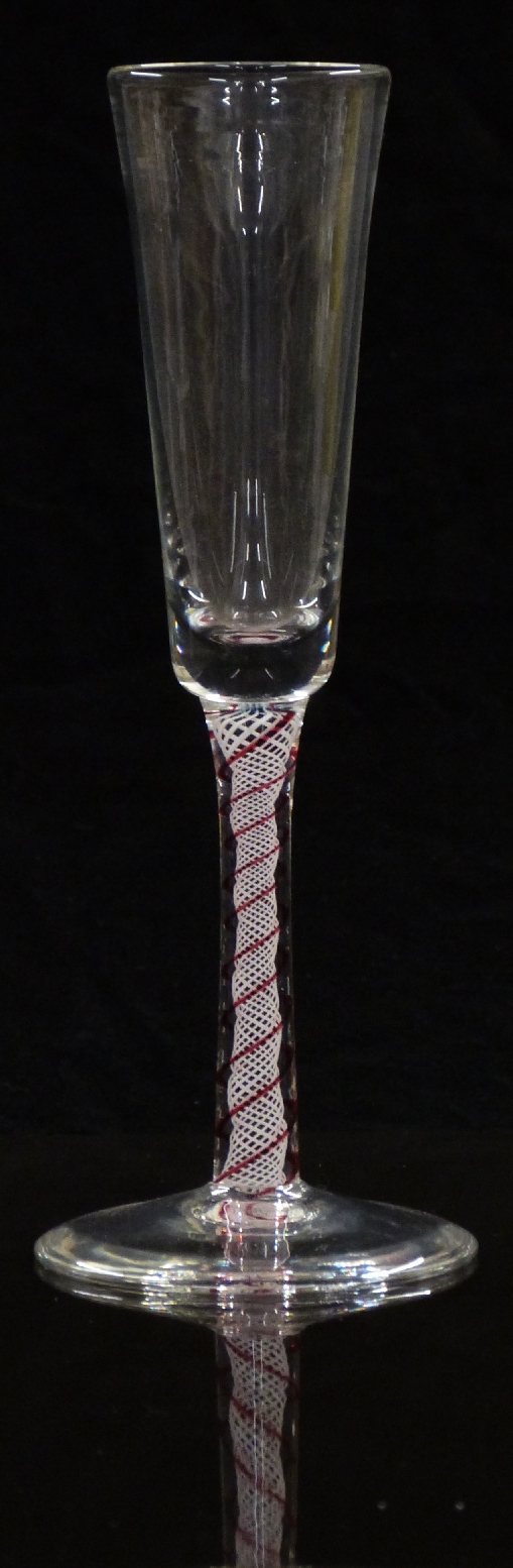 Mike Hunter Twists Glass clear drinking glass with red spiralling surrounding white latticino core