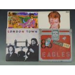 Approximately 20 albums of mixed genres including Bob Dylan, Wings, The Eagles and David Bowie