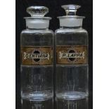 A pair of chemists/ pharmacy glass apothecary bottles with gilt labels for Gentiana and P. Lappa,