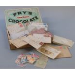 A box of covers including Victorian GB, loose stamps in packets and a 1946 unmounted mint Victory