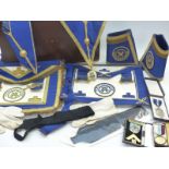 Masonic medal marked silver, ornate apron and other Masonic ephemera in leather case