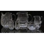 Four Waterford Crystal cut glass jugs, largest 15.5cm tall, together with a matching salt and pepper