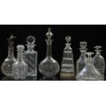 Eight various 19thC and later cut glass decanters including a ship example, one with an unusual