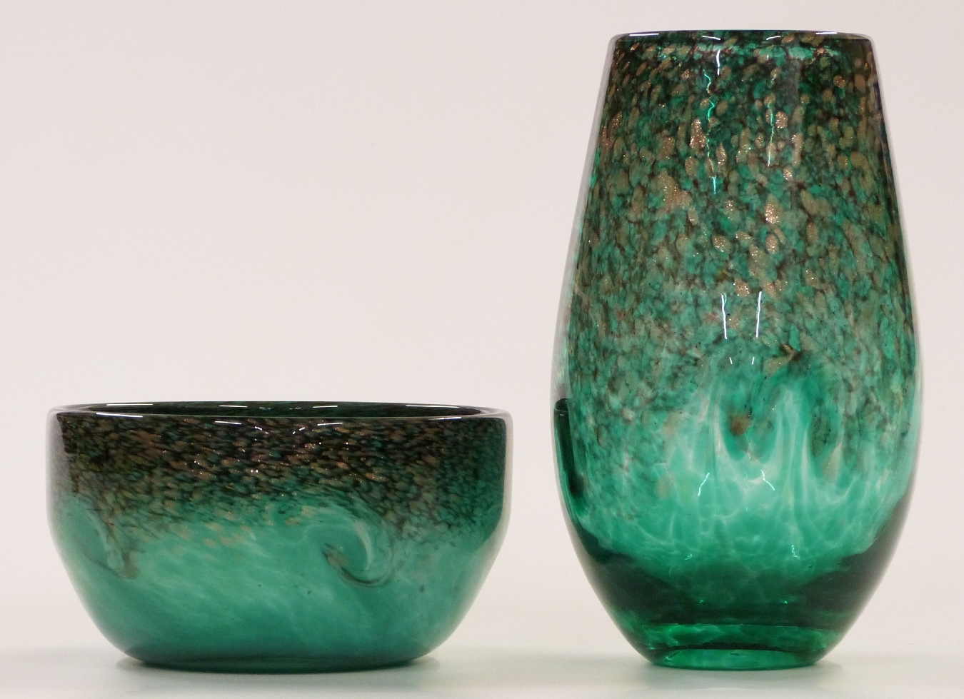 Two pieces of Strathearn glass both with green and black mottled ground and aventurine flecks, one a