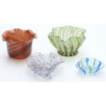 Four Murano/ Venetian style glass dishes in the form of Venini all with latticino decoration, two