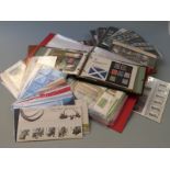 A quantity of GB presentation packs, loose and in two albums
