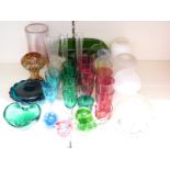 Thirty five pieces of coloured glassware including an Eickholt pulled feather iridescent glass vase,