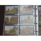 An album of postcards including examples by A W Bridgeman, Picturesque Counties sets including