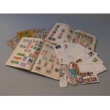 Welcome stamp album of all world stamps and four other albums