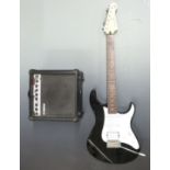 Yamaha Pacifica electric rhythm guitar with Yamaha GA-15 practice amplifier, both finished in black,