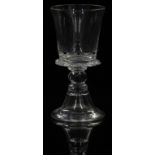 Mike Hunter Twists Glass clear drinking glass with applied red and blue ball decoration, raised on