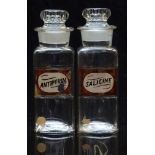 A pair of chemists/ pharmacy glass apothecary bottles with gilt labels for Salicine and Antipyrin