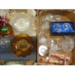 A large collection of clear and coloured glassware including boxed engraved glass sets, flash