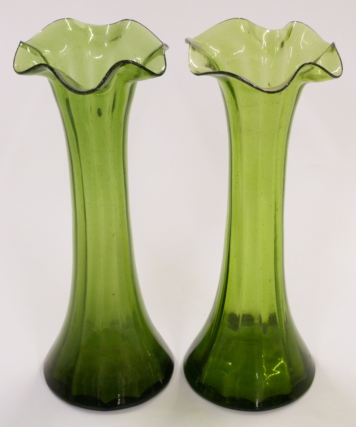 A pair of Art Nouveau green glass vases with frilled rims, 30cm tall. - Image 2 of 2