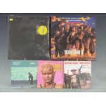 Approximately 20 LPs and 12 inch singles including an Abba box set, AC/DC, Aerosmith, also