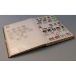 A large stockbook of GB stamps, mainly QEII but including mint George VI blocks