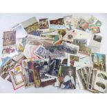 A collection of postcards including Devonshire Regiment greetings card, Barnsley, Gloucestershire,