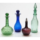 Four coloured glass decanters comprising one amethyst with white metal stopper in the form of a lady