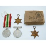 British Army WWII medals comprising 1939/1945 Star, Atlantic Star, War Medal and Defence Medal