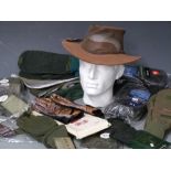 A selection of shooting gloves, oversocks, ties etc together with overtrousers and a Kakadu