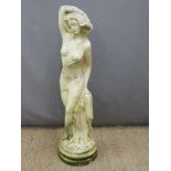 Garden statue of a nude lady