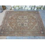 Large handmade Eastern rug or carpet having beige or teraccota ground with central blue and beige