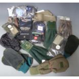 A selection of shooting gloves, oversocks, overtrousers etc together with Mae West sports gloves,