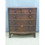 A late Georgian / early Victorian mahogany bow fronted chest of two over three drawers, with