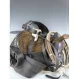 South American western style leather saddle with embossed decoration, stirrups, engraved studs and
