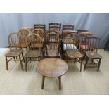 Sixteen 19thC and later chairs to include three rush seated ladder back examples, two 19thC